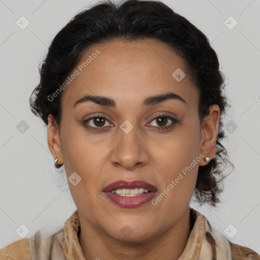 Joyful latino adult female with long  brown hair and brown eyes