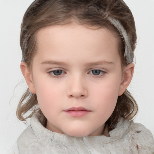 Neutral white child female with medium  brown hair and grey eyes