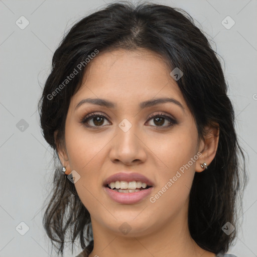 Joyful asian young-adult female with long  brown hair and brown eyes