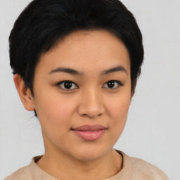 Joyful asian young-adult female with short  black hair and brown eyes