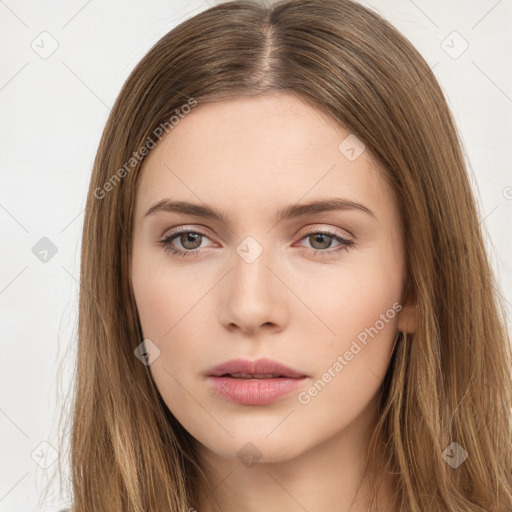 Neutral white young-adult female with long  brown hair and brown eyes