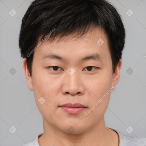 Neutral asian young-adult male with short  brown hair and brown eyes