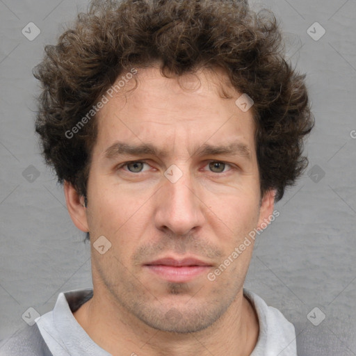 Neutral white adult male with short  brown hair and brown eyes