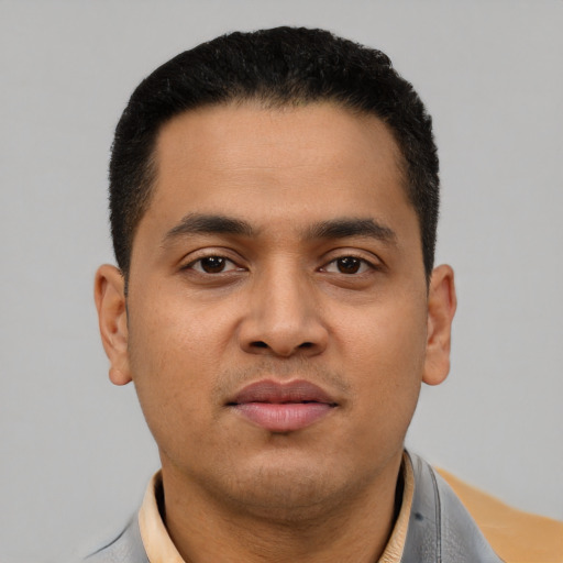Neutral latino young-adult male with short  black hair and brown eyes