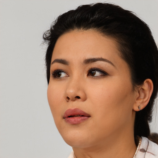 Neutral asian young-adult female with medium  black hair and brown eyes