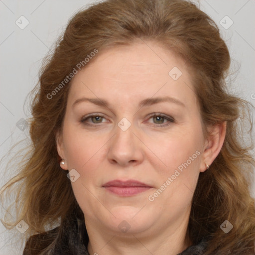 Joyful white adult female with long  brown hair and brown eyes