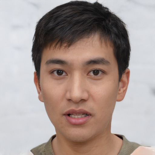Neutral asian young-adult male with short  brown hair and brown eyes
