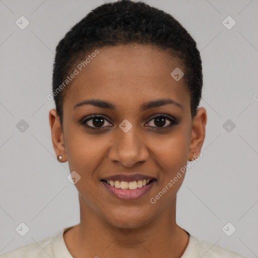 Joyful black young-adult female with short  black hair and brown eyes