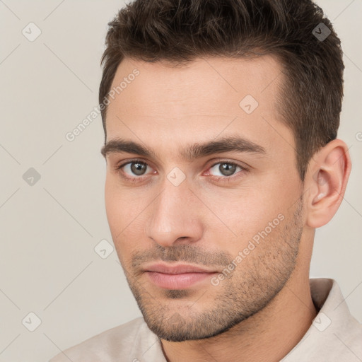 Neutral white young-adult male with short  brown hair and brown eyes