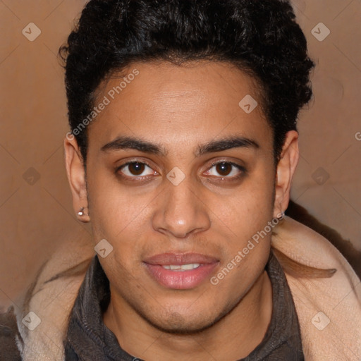 Joyful latino young-adult male with short  brown hair and brown eyes