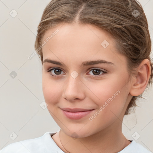 Joyful white child female with medium  brown hair and brown eyes