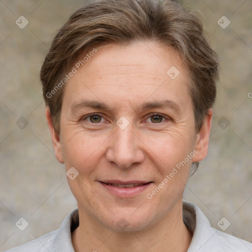 Joyful white adult female with short  brown hair and brown eyes