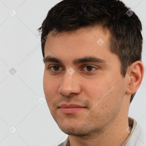 Neutral white young-adult male with short  brown hair and brown eyes