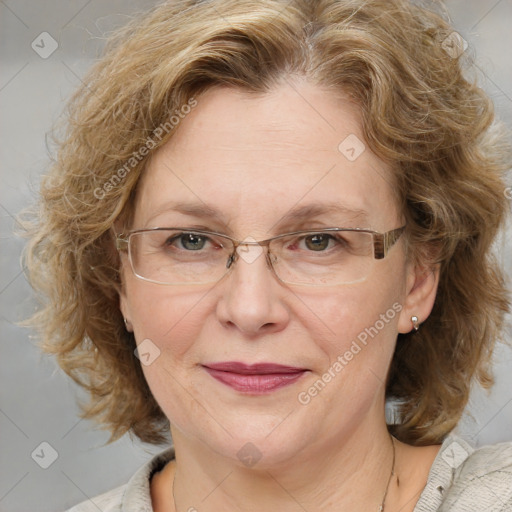 Joyful white adult female with medium  brown hair and blue eyes