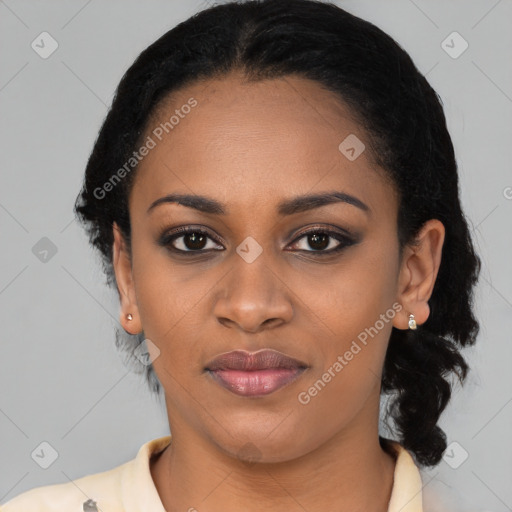 Joyful black young-adult female with medium  black hair and brown eyes