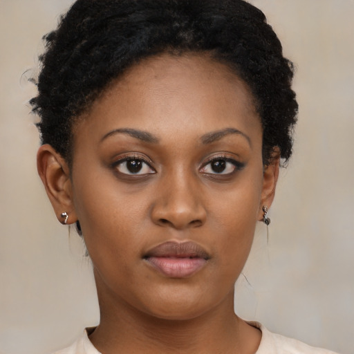 Neutral black young-adult female with short  brown hair and brown eyes