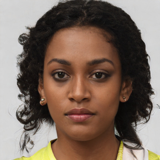Neutral black young-adult female with long  black hair and brown eyes