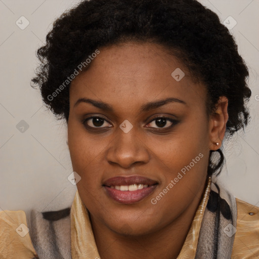 Joyful black young-adult female with long  brown hair and brown eyes