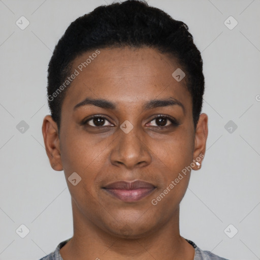 Joyful black young-adult female with short  black hair and brown eyes