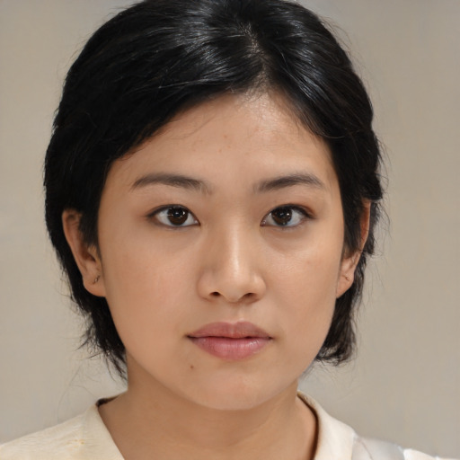 Neutral asian young-adult female with medium  black hair and brown eyes
