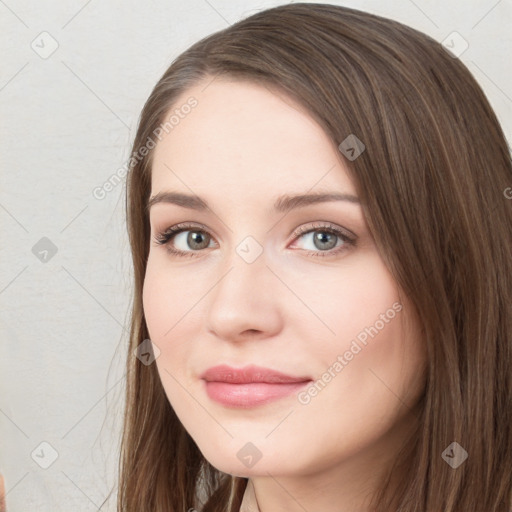 Neutral white young-adult female with long  brown hair and brown eyes