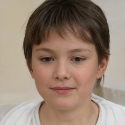 Joyful white child female with short  brown hair and brown eyes