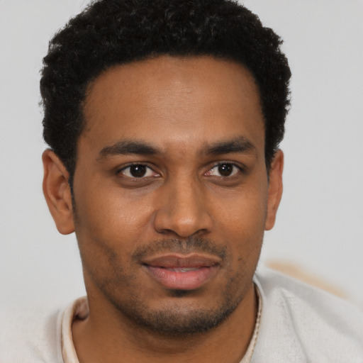 Neutral black young-adult male with short  brown hair and brown eyes