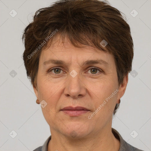 Joyful white adult female with short  brown hair and brown eyes