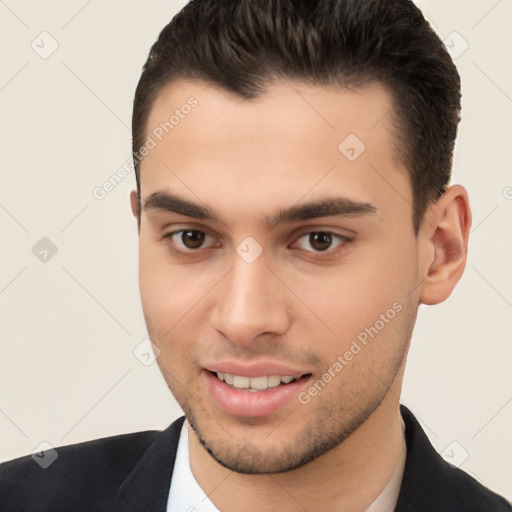 Joyful white young-adult male with short  brown hair and brown eyes