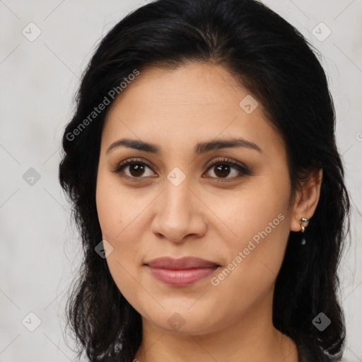 Joyful latino young-adult female with long  brown hair and brown eyes