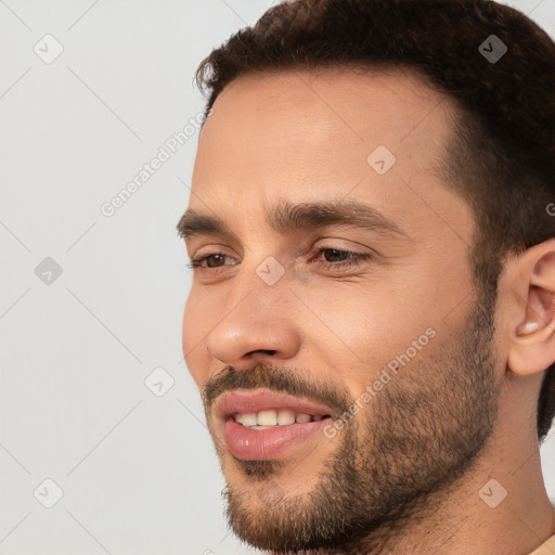 Joyful white young-adult male with short  brown hair and brown eyes