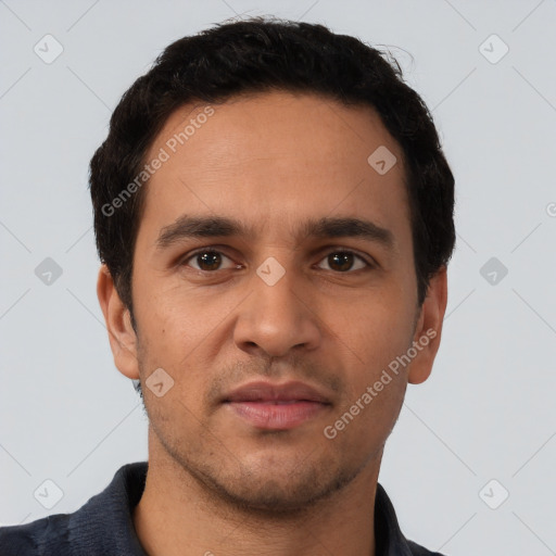 Neutral latino young-adult male with short  black hair and brown eyes