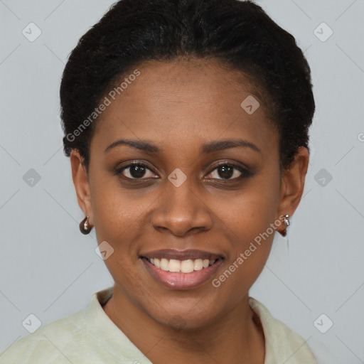 Joyful black young-adult female with short  black hair and brown eyes