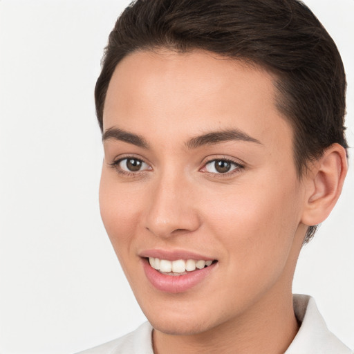 Joyful white young-adult female with short  brown hair and brown eyes