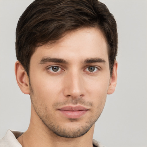 Neutral white young-adult male with short  brown hair and brown eyes