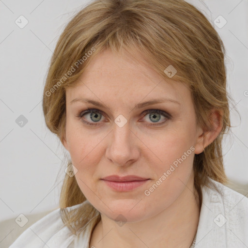 Joyful white young-adult female with medium  brown hair and blue eyes