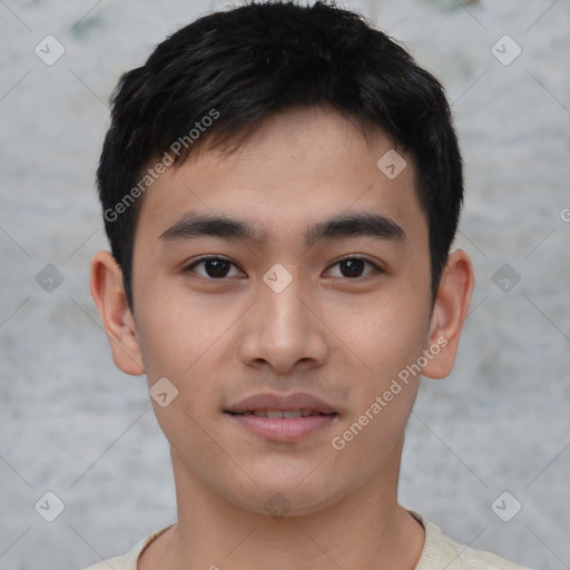 Joyful asian young-adult male with short  black hair and brown eyes