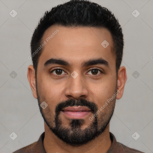 Neutral latino young-adult male with short  black hair and brown eyes