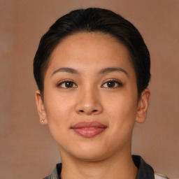 Joyful asian young-adult female with short  brown hair and brown eyes