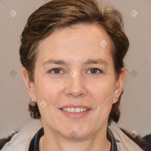 Joyful white adult female with medium  brown hair and brown eyes