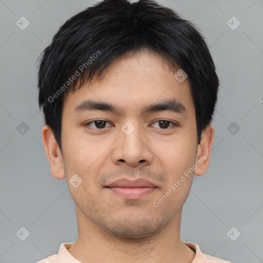 Joyful asian young-adult male with short  black hair and brown eyes