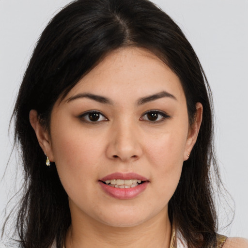 Joyful asian young-adult female with medium  brown hair and brown eyes