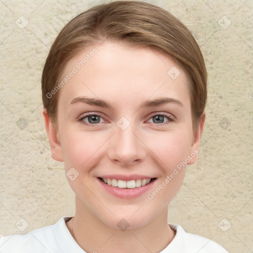 Joyful white young-adult female with short  brown hair and grey eyes