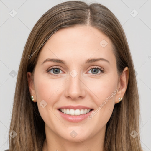 Joyful white young-adult female with long  brown hair and grey eyes