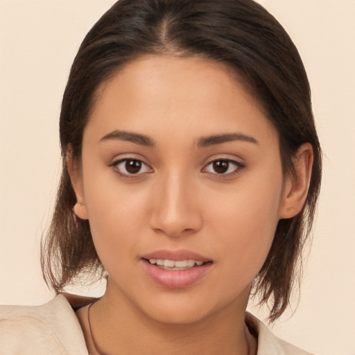 Joyful white young-adult female with medium  brown hair and brown eyes