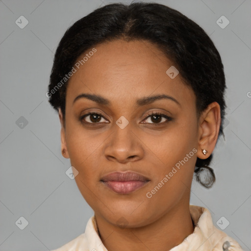 Joyful latino young-adult female with short  black hair and brown eyes