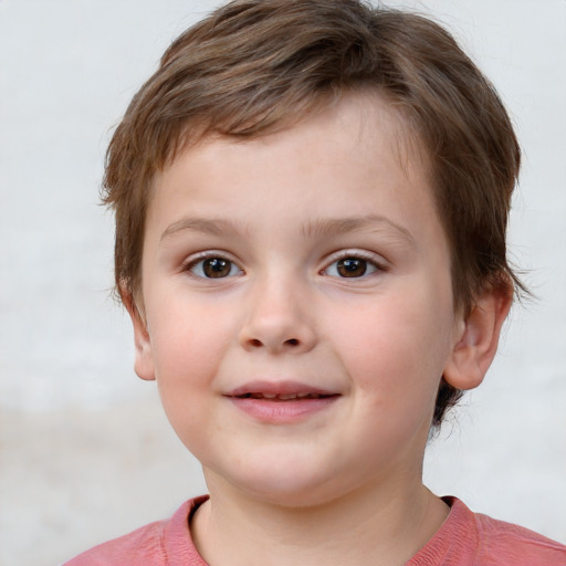 Joyful white child female with short  brown hair and brown eyes