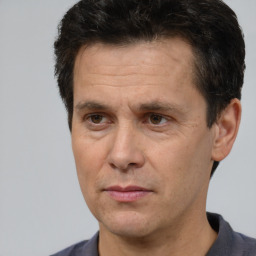 Neutral white adult male with short  brown hair and brown eyes