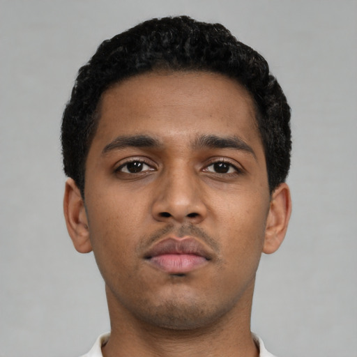 Neutral black young-adult male with short  black hair and brown eyes