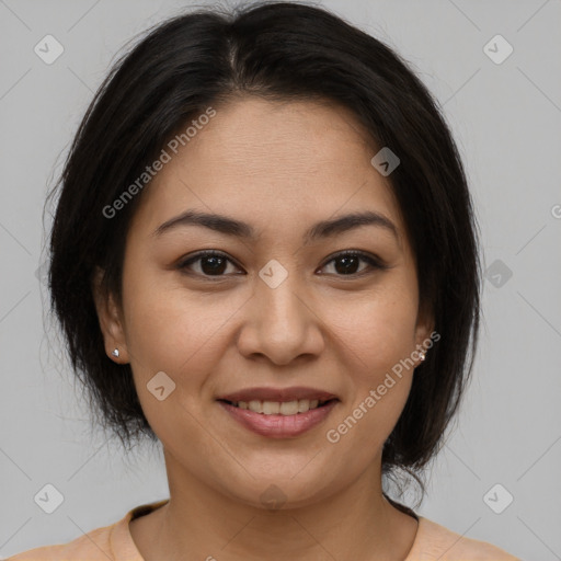 Joyful latino young-adult female with medium  brown hair and brown eyes